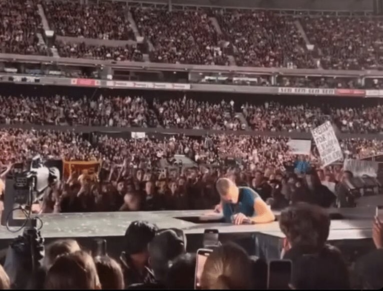 Chris Martin (pictured) in a trap door.